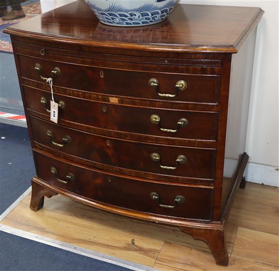 A George III style mahogany bow fronted chest, fitted four long drawers and a brushing slide W.76cm